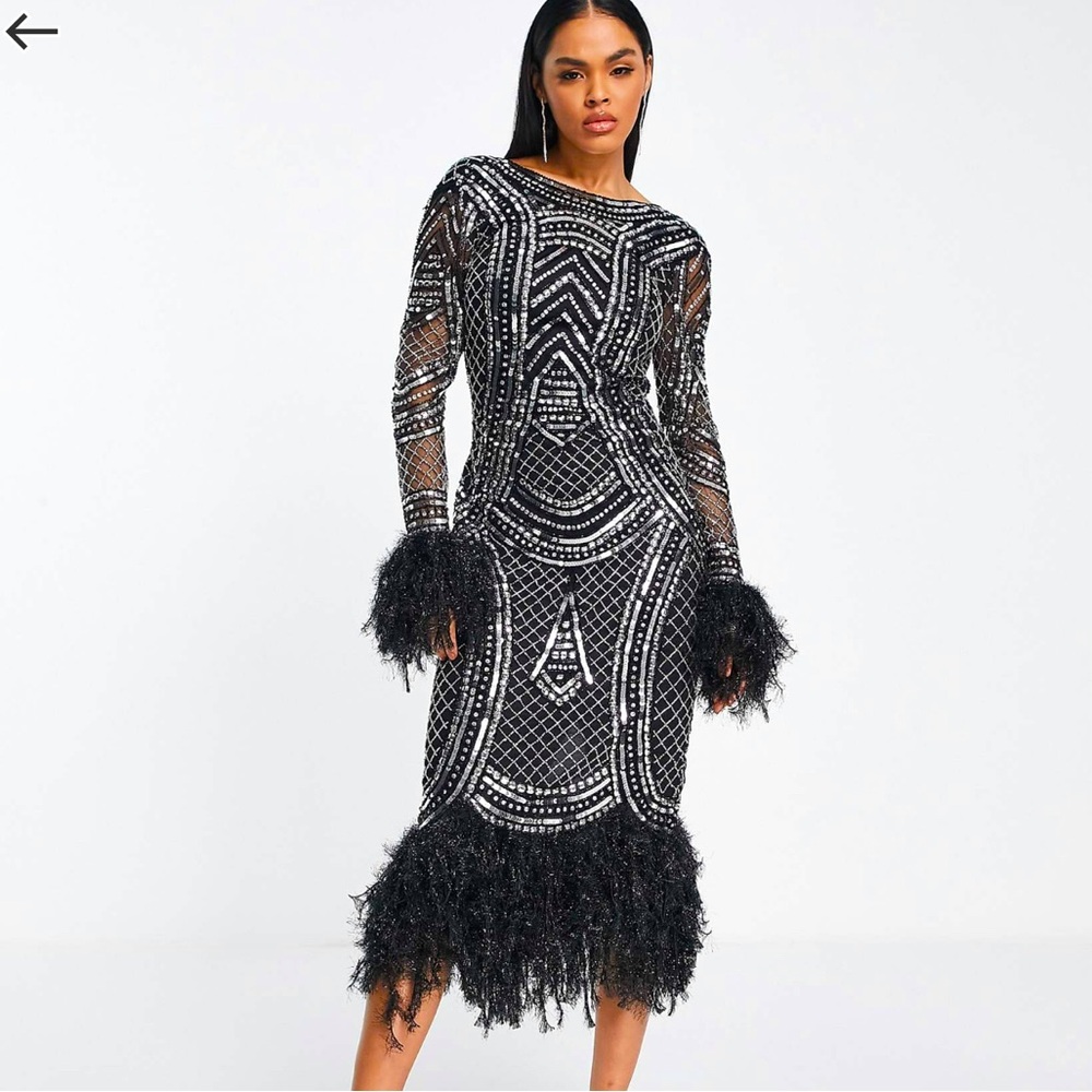 ASOS LUXE Black and Silver embellished dress
Size 8
Never worn